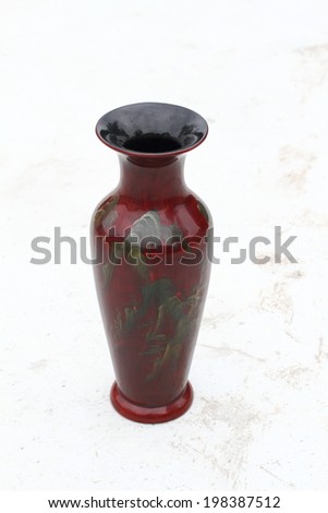 empty lacquered wooden vase isolated on white background