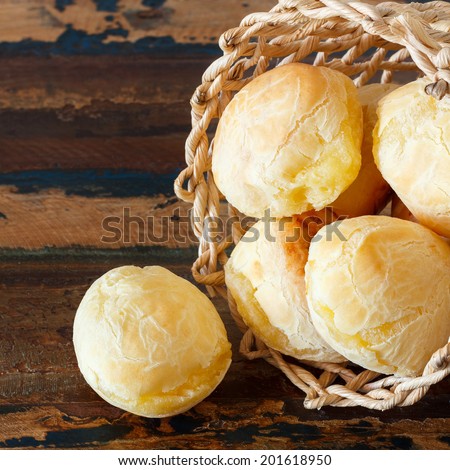 Brazilian snack cheese bread (pao de queijo) in wicker basket. Selective focus