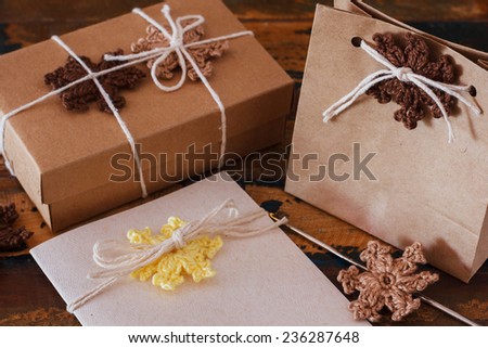 White crochet snowflakes for Christmas decoration of greetings card. Selective focus