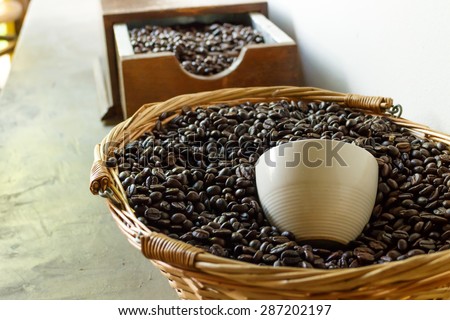 roasted coffee beans, in brown basket soft focus, focus on coffee