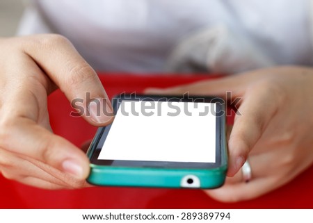 playing a smart-phone with both hands, focus on finger