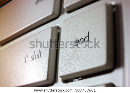close up white key board, soft focus, focus at end button photo