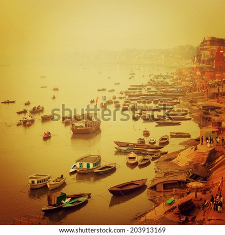 Small boats at Ganga river instagram effect Sunrise photo with retro filter Small boats at Ganga river instagram effect Sunrise photo with retro filter