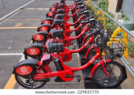 TOKYO, JAPAN --31 OCTOBER 2014-- Shared bikes are lined up in the streets of Tokyo. Minato Bicycle Sharing, sponsored by Docomo, was launched in October 2014 in Minato-ku.