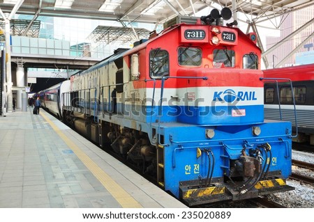 SEOUL, SOUTH KOREA --25 OCTOBER 2014-- High-speed bullet trains (KTX) and Korail trains stop at the Seoul station in South Korea.