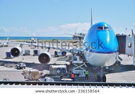 SAINT MARTIN, DUTCH ANTILLES --30 NOVEMBER 2014-- A Boeing 747-800 from Dutch flag carrier KLM is parked at a gate at the Princess Juliana International Airport (SXM) in Saint Martin (Sint Maarten).