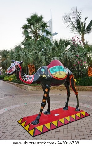 DUBAI, UNITED ARAB EMIRATES --22 DECEMBER 2014-- Statues of dromedary camels with colorful paintings are located throughout the busy city of Dubai in the United Arab Emirates (UAE).