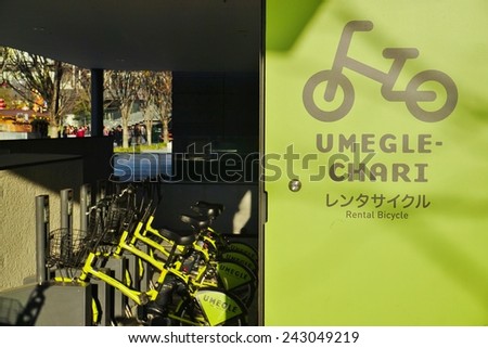 OSAKA, JAPAN - 13 DECEMBER 2014 - Shared bikes by the Umegle Chari service are lined up in the streets of the Japanese seaport of Osaka.