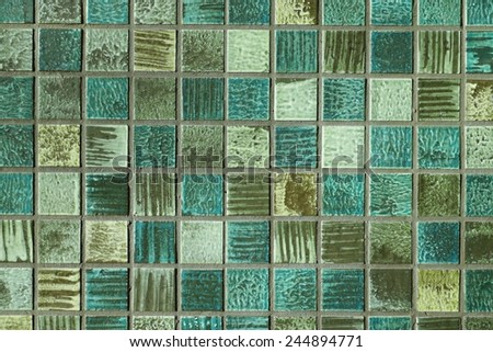 Mixed green colored square tile mosaic background