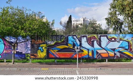 LIMASSOL, CYPRUS--4 JANUARY 2015-- Colorful graffiti art line the street walls and back alleys of Nicosia, Larnaca, and Limassol in Cyprus.