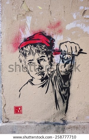 PARIS, FRANCE -26 FEBRUARY 2015- Editorial: Colorful graffiti art line the street walls and back alleys of the Butte-aux-Cailles neighborhood in the 13th arrondissement of the French capital.