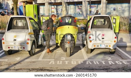 GRENOBLE, FRANCE -26 FEB 2015- Editorial: The town of Grenoble launched in 2014 Cite Lib by Hamo, shared ultra compact electric vehicles (made by Toyota) connected to public transport.