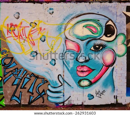 LONDON, ENGLAND -12 MARCH 2015- Editorial: On March 8, the Femme Fierce female street artist collective took over the Leake Street Graffiti Tunnel in honor of International Womens Day.