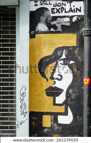 LONDON, ENGLAND -12 MARCH 2015- Editorial: Painted walls and graffiti art are scattered in the Brick Lane and Shoreditch area in East London in the heart of Banglatown.