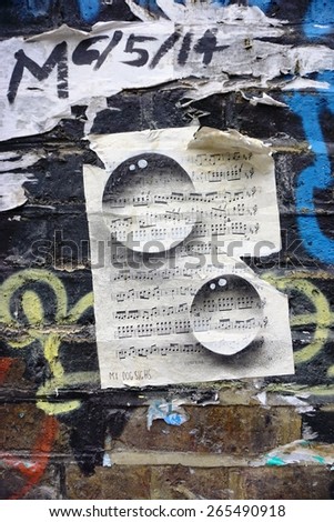 LONDON, ENGLAND -12 MARCH 2015- Editorial: Painted walls and graffiti art are scattered in the Old Street, Brick Lane and Shoreditch area in East London in the heart of Banglatown.