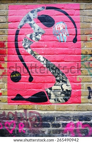 LONDON, ENGLAND -12 MARCH 2015- Editorial: Painted walls and graffiti art are scattered in the Old Street, Brick Lane and Shoreditch area in East London in the heart of Banglatown.