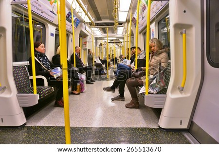 LONDON, ENGLAND -12 MARCH 2015- Editorial: The London Underground (familiarly called the Tube) is a public transit system serving 270 stations in greater London. Passengers pay with the Oyster card.