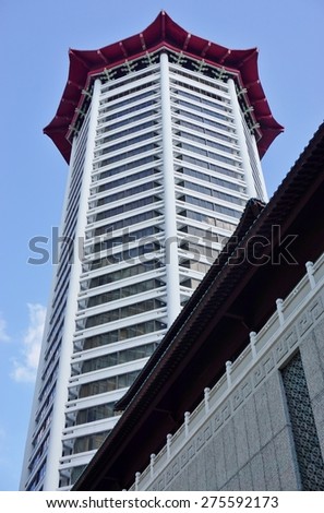 SINGAPORE -17 APRIL 2015- Located on Orchard Road in Singapore, the Tang Plaza includes the TANGS department store, a mall complex, and the Marriott Hotel Singapore.