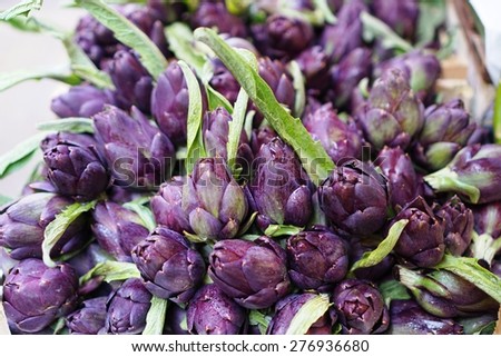 Purple artichokes at an Italian farmers market