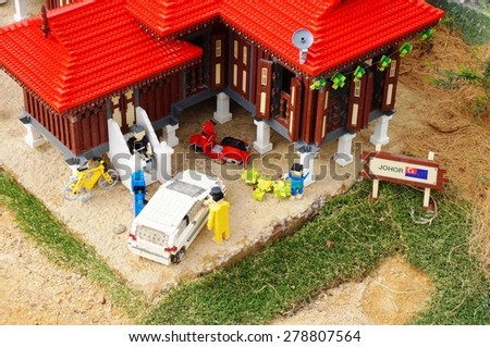JOHOR, MALAYSIA -3 AUGUST 2014- Scenes from kampung village houses in Malaysia built out of Lego bricks at the Miniland attraction in Legoland Malaysia, opened in 2012.