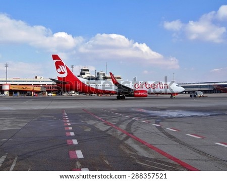 BERLIN, GERMANY -14 MARCH 2013- An Airbus A 320 from Air Berlin (AB), the second largest airline in Germany after Lufthansa, is parked at the Berlin-Tegel Airport (TXL).