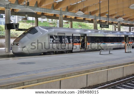 OSLO, NORWAY -30 MAY 2015- The Flytoget Airport Express Train is a Norwegian high speed rail connecting the Oslo Airport Gardermoen (OSL) to Oslo Central Station in nineteen minutes.