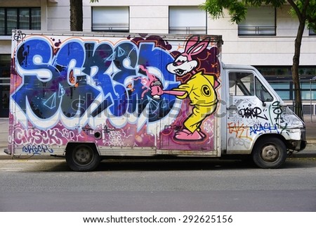 PARIS, FRANCE -26 FEBRUARY 2015- Paris has become one of the European capitals for graffiti street art. Many delivery trucks are spray painted with colorful graffiti tags.