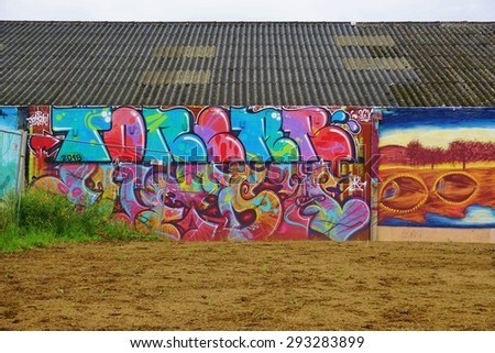 RENNES, FRANCE -14 JUNE 2015- L'Elaboratoire is an artists squat in the eastern area of Rennes, the capital of Brittany in France. Colorful graffiti street art lines its walls.
