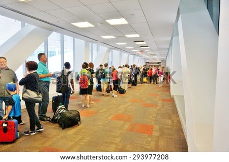 PHILADELPHIA, PA- 22 JUNE 2015- Passengers wait in line at the TSA security check at the Terminal A at the Philadelphia International Airport (PHL).