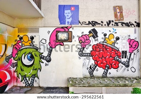 PARIS, FRANCE -15 JUNE 2015- Graffiti paintings by famous street artists line the street walls and back alleys of the Butte-aux-Cailles neighborhood in the 13th arrondissement of the French capital.