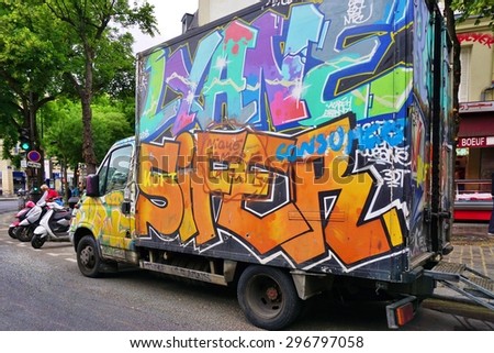 PARIS, FRANCE -20 JUNE 2015- Paris has become one of the European capitals for graffiti street art. Many delivery trucks are spray painted with colorful graffiti tags.