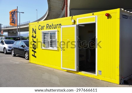ATHENS, GREECE -13 JULY 2015- Yellow Hertz car rental return shed at the Athens International Airport Eleftherios Venizelos (ATH).