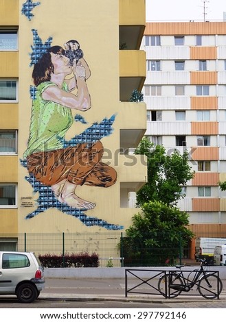 PARIS, FRANCE -18 JUNE 2015- Wall mural by street artist Janaundjs on rue Jeanne d Arc in the 13th arrondissement of the French capital.