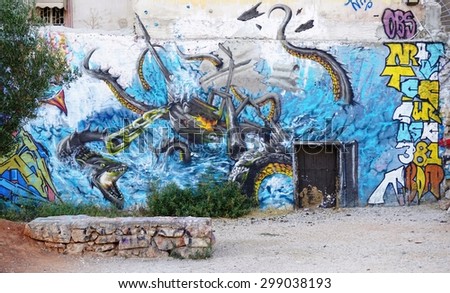 ATHENS, GREECE -14 JULY 2015- Graffiti street art has proliferated on the street walls and back alleys of central Athens since the onset of the Greek euro crisis in 2010.