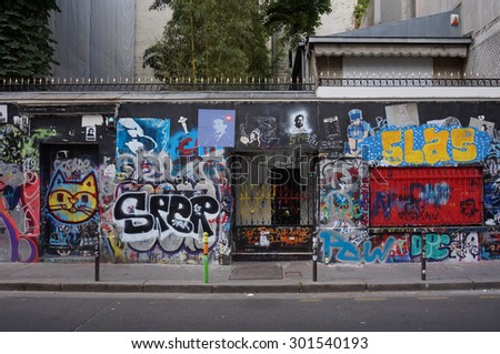 PARIS, FRANCE -8 JULY 2015- The former house of famous French singer Serge Gainsbourg on rue de Verneuil in the 7th arrondissement of Paris is covered with graffiti by fans.