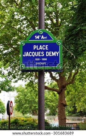 PARIS, FRANCE -8 JULY 2015- Street sign for Place Jacques Demy in the 14th arrondissement of Paris. Demy was a French director specializing in musical movies.