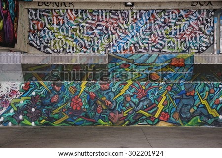 PARIS, FRANCE -15 JUNE 2015- Graffiti paintings and street art murals near the Gare d Austerlitz train station in the 13th arrondissement of the French capital.