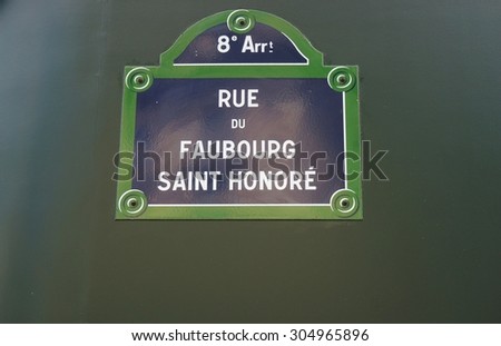 PARIS, FRANCE -8 JULY 2015- Street sign for the rue du Faubourg Saint Honore street in the 8th arrondissement of Paris.
