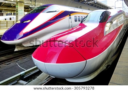 TOKYO, JAPAN -8 AUGUST 2015- A red E6 Series Shinkansen high-speed bullet train operated by JR East at the Tokyo station.