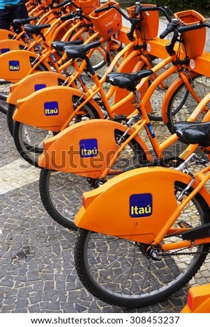 RIO DE JANEIRO, BRAZIL -25 JULY 2015- Bike Rio offers shared bicycles through the SAMBA public bike system. The orange Itau bikes are available for rent throughout Rio de Janeiro.