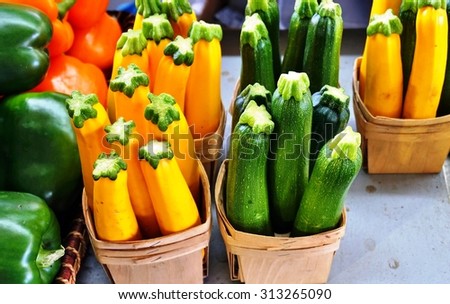 Yellow and green zucchini summer squash at the farmers market