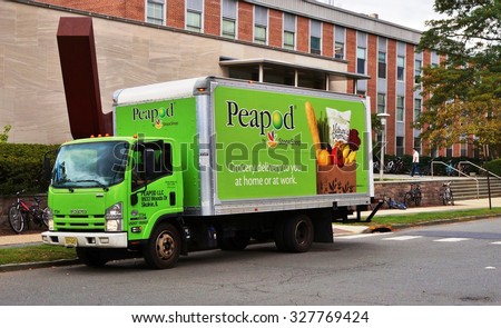 PRINCETON, NJ -14 OCTOBER 2015- A green Peapod by Stop and Shop truck is making a grocery delivery in New Jersey.