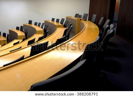 An empty modern lecture style university classroom