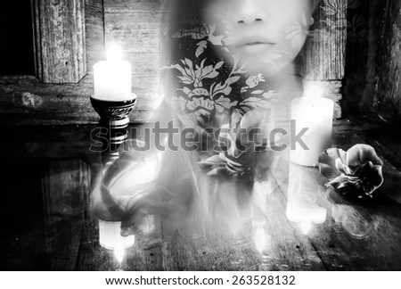 Double exposure woman with still life  candle light spa , filter effects black and white tone