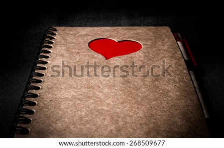 Recycled  paper brow notebook with red heart ,front cover