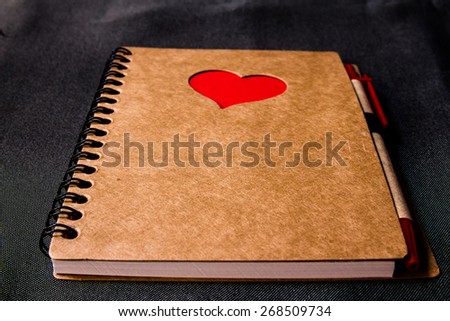 Recycled  paper brow notebook with red heart ,front cover