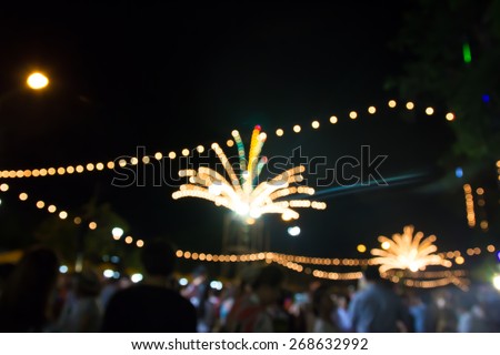 Image of  light  on street  with festive lights.blurred background