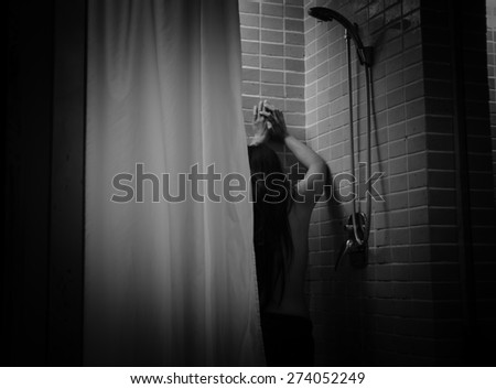 Black white portrait of young woman in bathrooms ,Sad concept