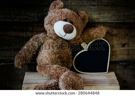 Teddy bear sit with heart Still life art photography