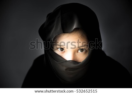 Portrait of a young  woman in the dark,Immigrant